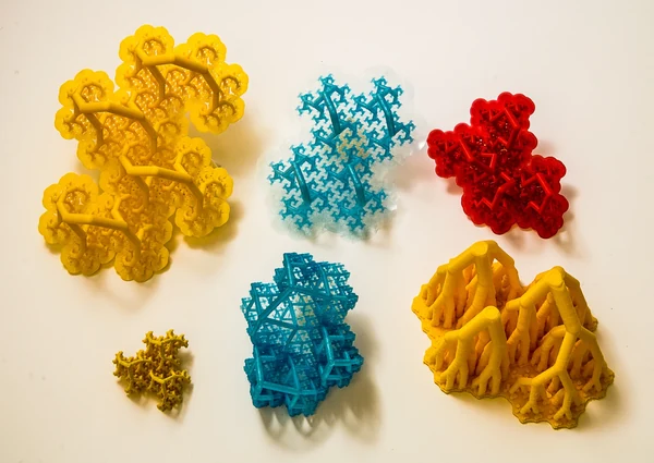 Six yellow, blue and red 3D-printed complex trees in the 2019 Arboretum.